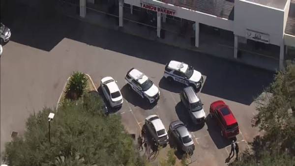 Heavy police presence reported near shopping center in Orange County