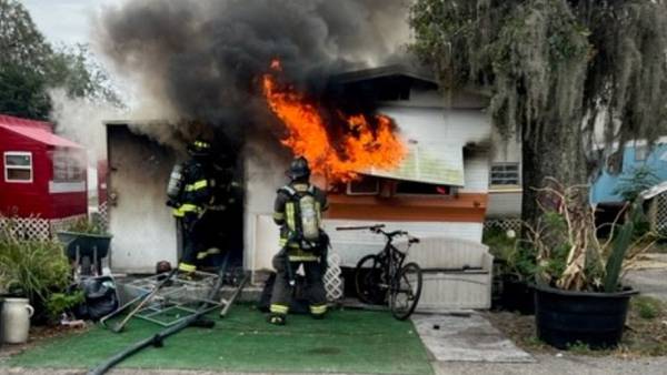 DeLand police investigate cause of mobile home fire