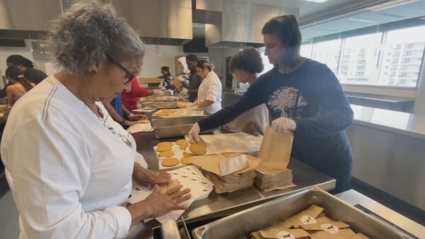 Photos: Salvation Army works with Valencia College to serve Thanksgiving meals for thousands in need