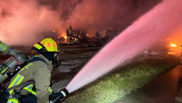 Photos: Seminole County and Sanford firefighters respond after several semi trucks catch fire