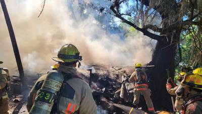 Photos: Crews battle abandoned house fire in Orange County