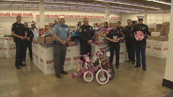 Kissimmee police share in the Christmas spirit with donation to Toys for Tots