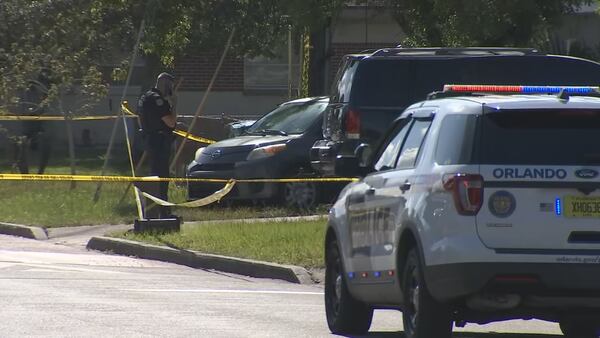Photos: Man killed, another injured in shooting at Orlando home