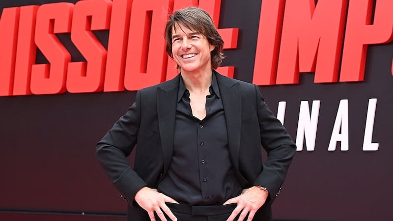 Tom Cruise breaks world record for most burning parachute jumps