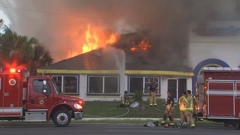 Photos: Fire burns at Kissimmee pawn shop