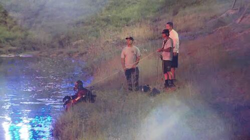 Car submerged in downtown Orlando retention pond