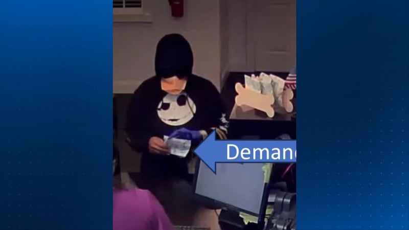 New photo released of former Marion County deputy accused of robbing bank