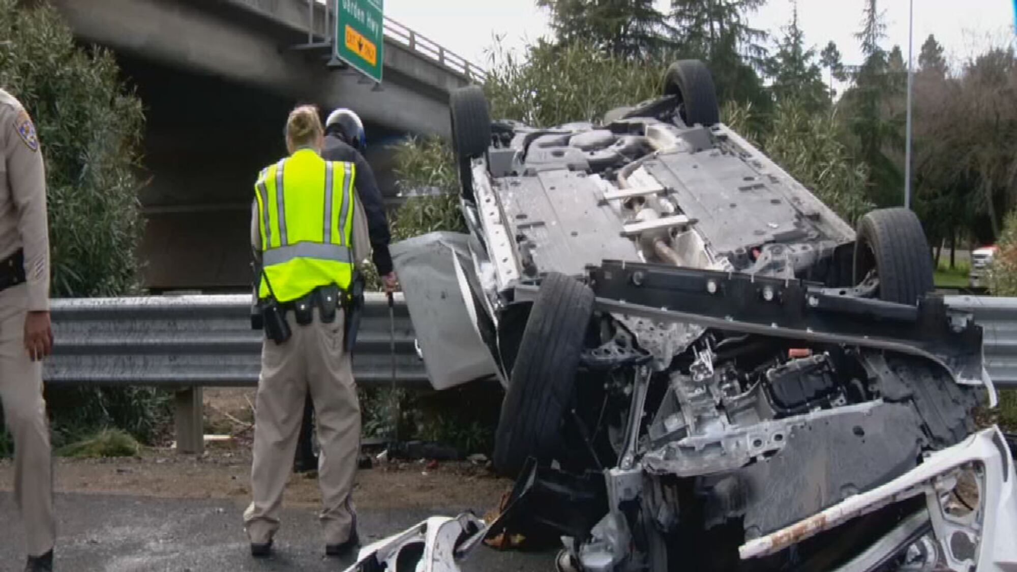 Photos: Driver crashes off overpass and into interstate median in Photos: Driver crashes off overpass and into interstate median in