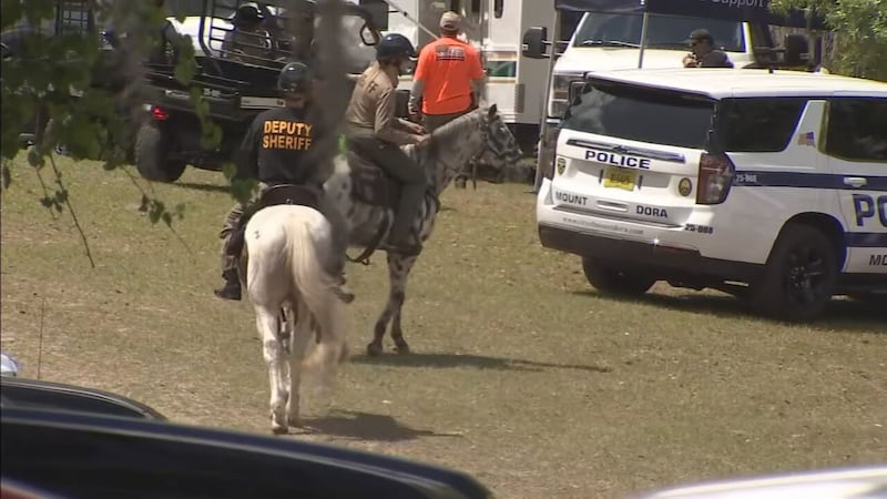 Officers search lake, conservation land for missing 41-year-old mother