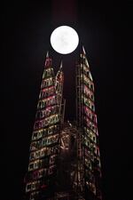 A Super Snow Moon rises above the Shard, in central London.