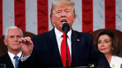 President Donald Trump delivers his State of the Union address to a joint session of Congress in the House Chamber on Capitol Hill in Washington, Tuesday, Feb. 4, 2020, as Vice President Mike Pence and Speaker Nancy Pelosi look on.