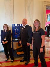 Kate Gebo, United Executive Vice President of Human Resources and Labor Relations; Mitch Landrieu, Senior Advisor to the President of the United States; and Heather Behrent, United Aircraft Maintenance Technician.
