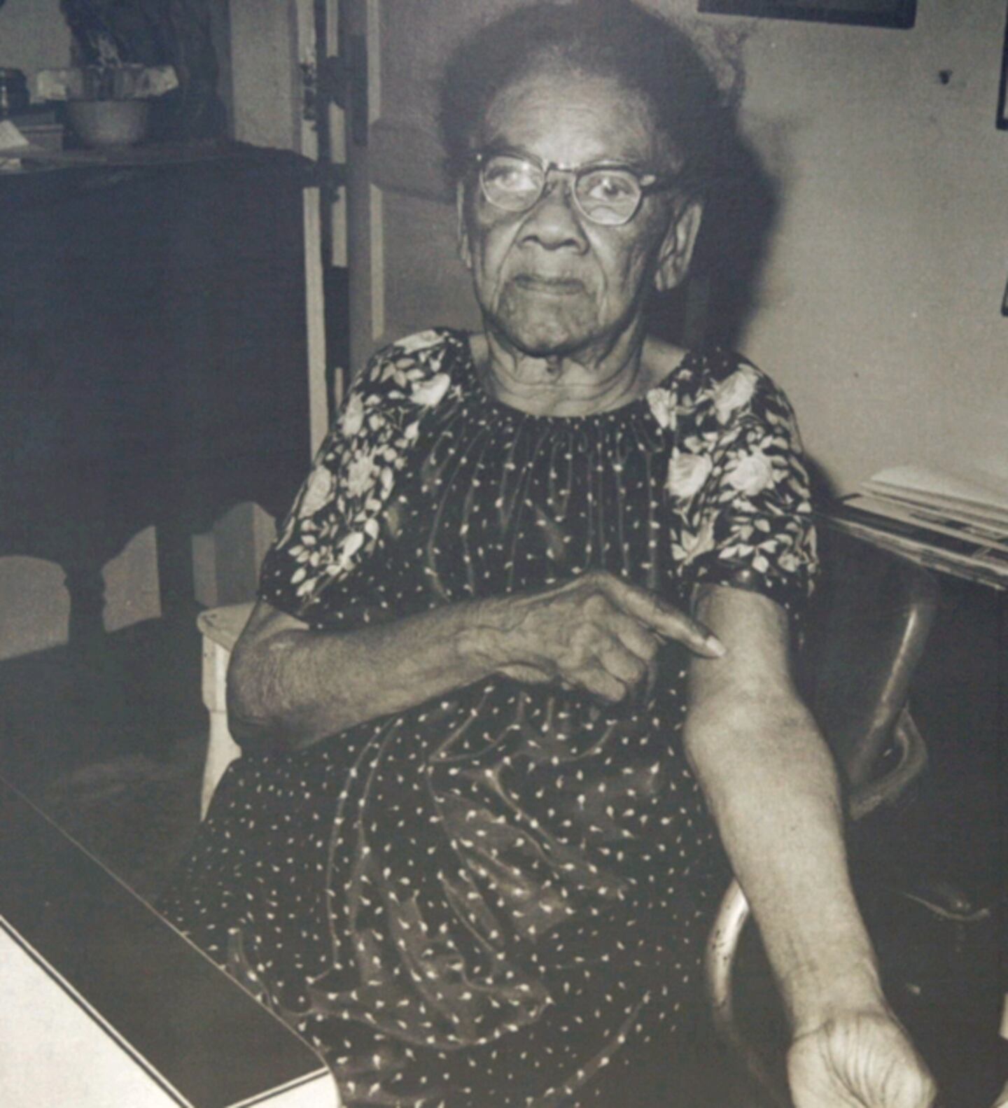 Caretha Perry, daughter of July Perry, was injured during the Ocoee Massacre in 1920. She points to the location of the injuries in this undated photo.