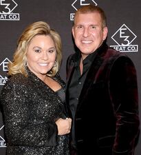 NASHVILLE, TENNESSEE - NOVEMBER 20: Julie Chrisley and Todd Chrisley attend the grand opening of E3 Chophouse Nashville on Nov. 20, 2019 in Nashville, Tennessee.
