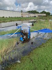 Officials say two people inside the plane were able to climb out of the experimental aircraft before fire crews arrived.
