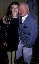 1989: Mayim Bialik and Mickey Rooney attend Miss Hollywood Party on April 3, 1989, at Chasen's Restaurant in Beverly Hills, California.