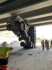 A dump truck is wedged under the SR-436 overpass on I-4 near Altamonte springs.