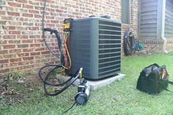 Should I replace or repair my broken air conditioning system?