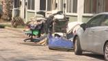 Homeless encampment finally cleared from Daytona Beach surf shop’s parking lot