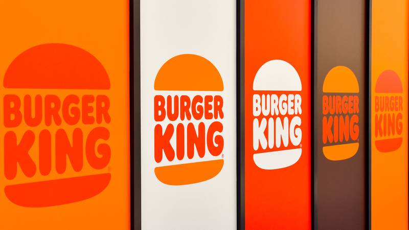 Burger King sign outside of a restaurant.