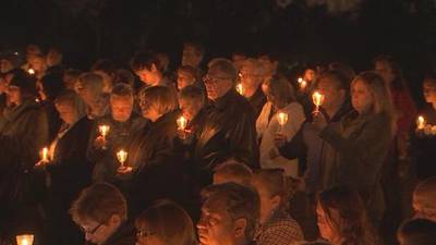 Community gathers for candlelight vigil to honor slain Celebration family