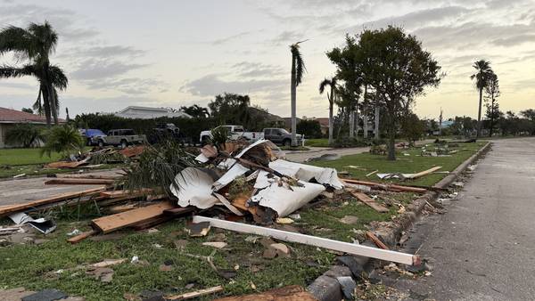 Photos: Cocoa Beach residents left to clean up what Milton left behind